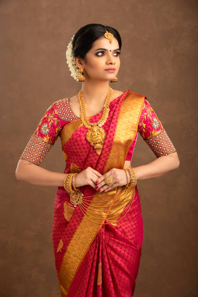 istock Pretty Indian young Hindu Bride in studio shot. 1270784863