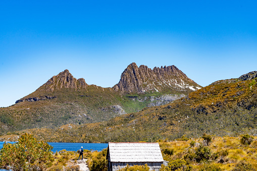 Tasmania, Australia - December 9, 2019: Tourists are enjoying the view of Cradle Mountain and Dove Lake in Tasmania, Australia.
