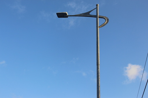 Public street lamp against blue skies at the afternoon in cilacap Indonesia