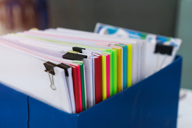 istock File document and report in box for moving to new office 1270793384