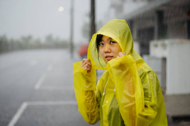 istock Asian Chinese woman in heavy rain 1270793407