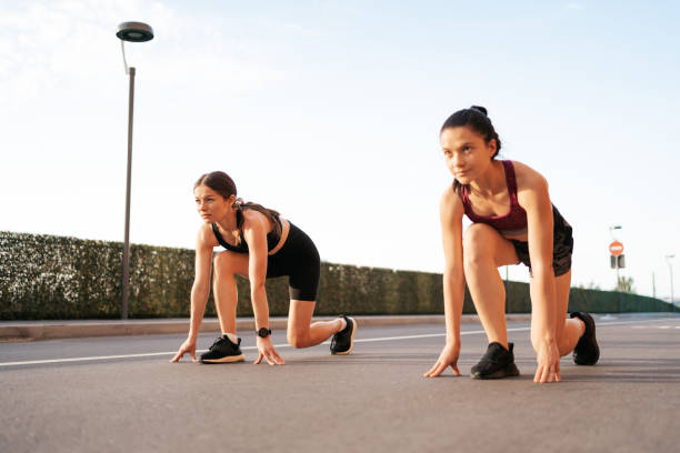 istock Female runners ready to start running and racing each other 1270795096