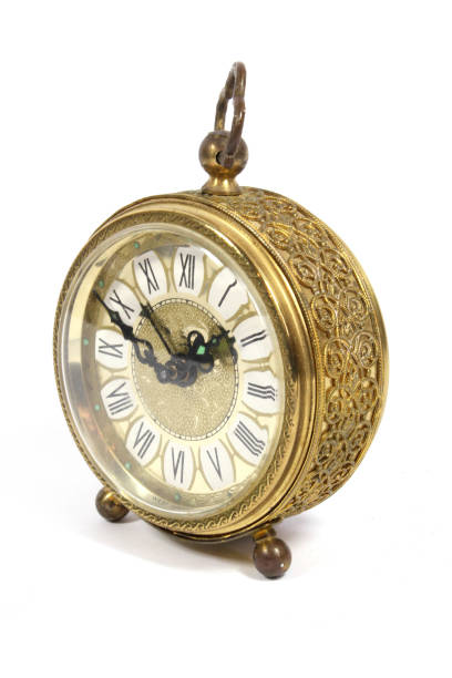 istock A Vintage Antique Desk Clock on White Background 1270796339
