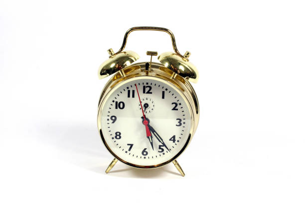 istock A Vintage Antique Desk Clock on White Background 1270796356