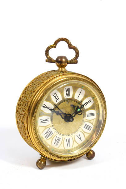 istock A Vintage Antique Desk Clock on White Background 1270796394