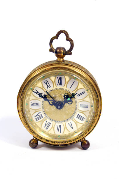 istock A Vintage Antique Desk Clock on White Background 1270796399