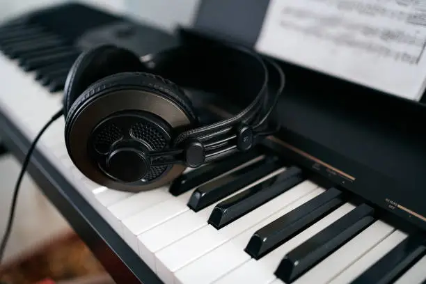 Photo of Headphones that lying down on the keyboard