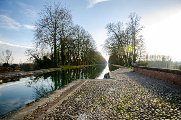 Looking west along the Canal lateral a la Loire at Cuffy, from the Pont canal du Guetin, south west of Nevers, Bourgogne Franche Comte, France.