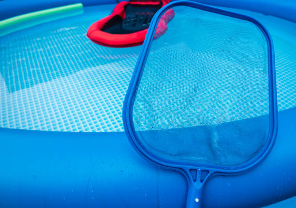 istock Net to clean the garden pool 1270800616