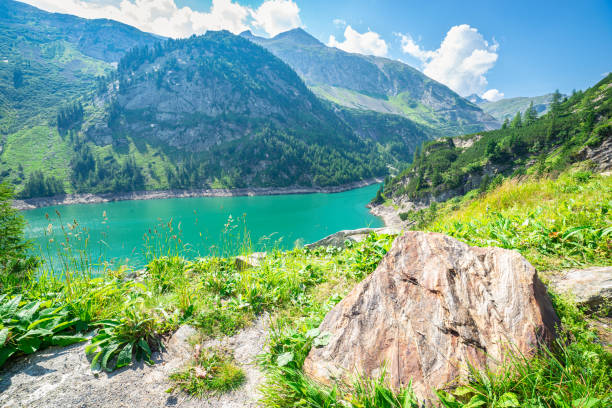Aerial view of reservoir and hydro dam below mountains, Maltatal, Carinthia, Austrian Alps
