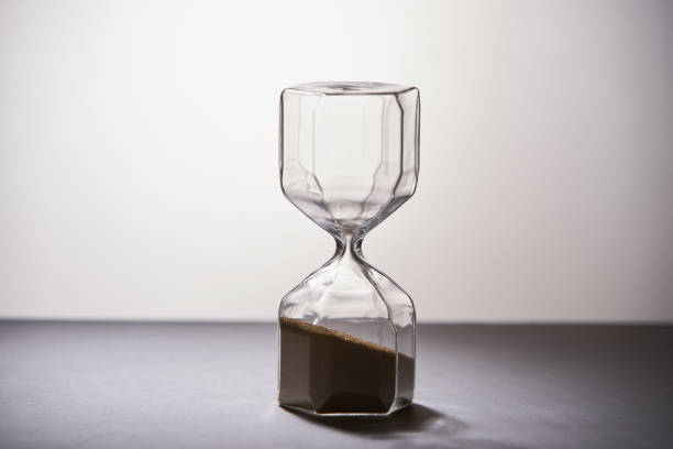 istock Hourglass Isolated on gray Background 1270803706