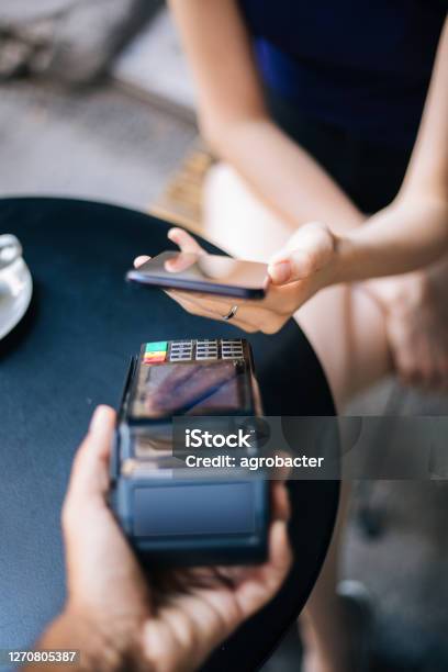 Contactless Smartphone Payment Stock Photo - Download Image Now - Paying, Contactless Payment, Mobile Phone