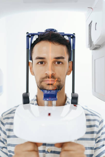 istock Young man in a dental 3D scanner 1270807676