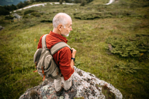 istock Senior man taking a break on top of the Hill 1270807925