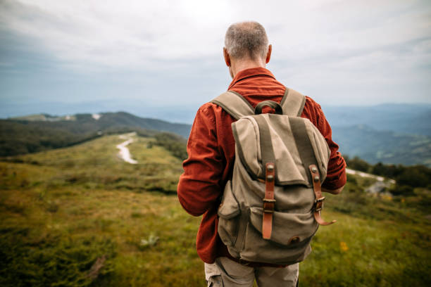istock Senior man taking a break on top of the Hill 1270807967