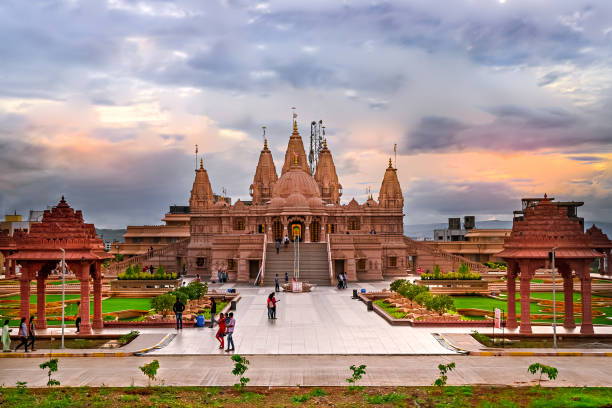 Pune , India: September 18th, 2017- Evening sky with Shree Swaminarayan temple, Ambe Gaon, Pune . Pune , India: September 18th, 2017- Evening sky with Shree Swaminarayan Mandir, Ambe Gaon, Pune . hindu temple in india stock pictures, royalty-free photos & images