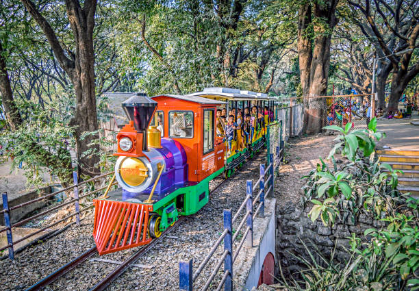 Chugging her way through decades, on the same loops and curves, the iconic toy train - Fulrani , glistens in the bright sunlight, her vibrant blue, red, yellow and green colours beckoning the children to take a ride with her.