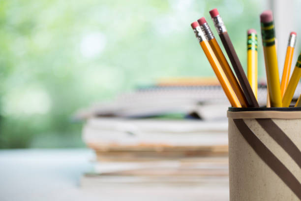 Single pencil standing paper background