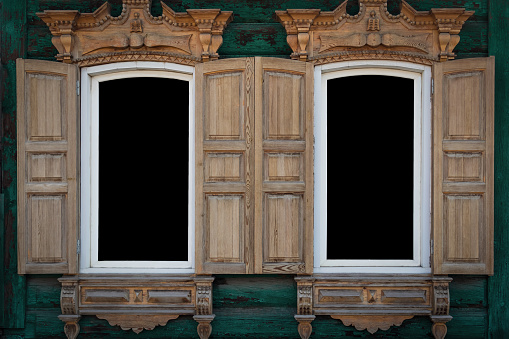 Texture of two wooden open windows with mockup. Blank for the designer. Old dilapidated building.