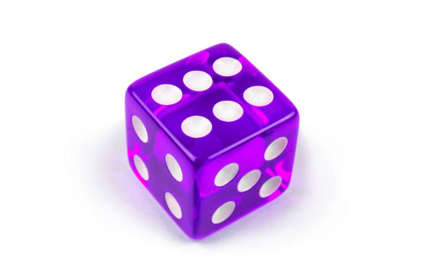 istock Purple glass game dice closeup isolated on white. Six with shadow. 1270820524