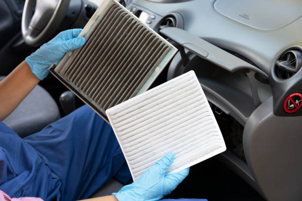 Replacement of cabin pollen air filter for a car Clean and dirty cabin pollen air filter for a car passenger cabin photos stock pictures, royalty-free photos & images