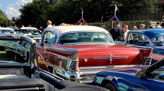 Black retro Chevrolet Bel Air with open car hood. 1955 Chevy at car exhibition. Snohomish, WA, USA - September 2022