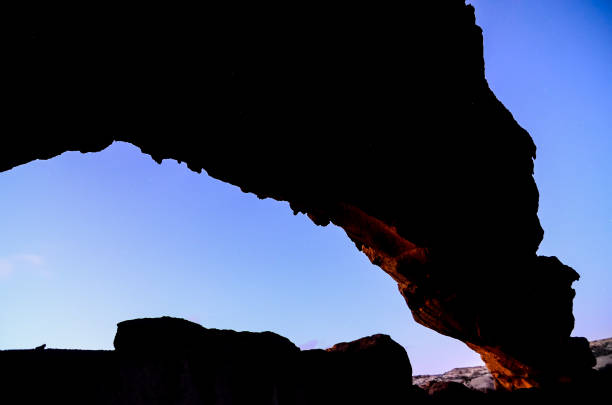 istock Natural Arch in the Desert 1270834471