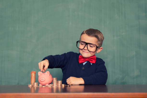 istock Young Boy Nerd Saves Money 1270835417
