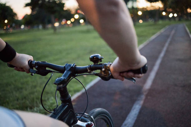 istock Unrecognizable man riding a bicycle on a running track outdoors 1270837271