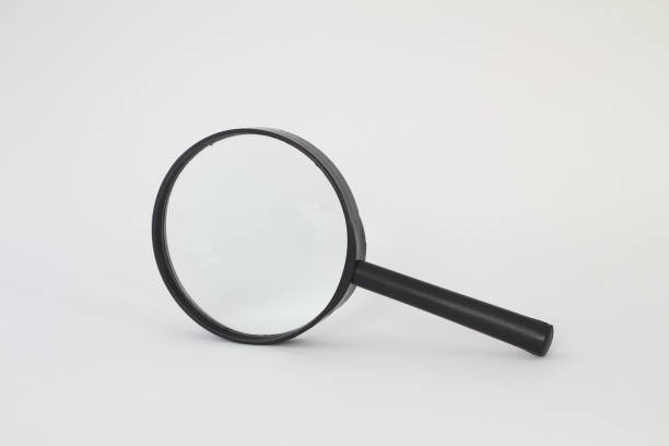 istock Black magnifying glass (magnifier) isolated on white background. Design element with clipping path. 1270838516