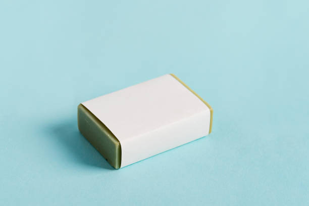 istock Soap wrap Box Mock-up package with bar olive soap isolated on blue background 1270840254