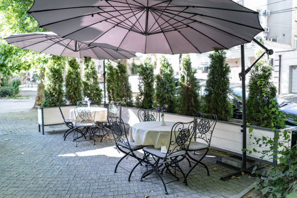 istock Table and chairs in empty restaurant cafe outdoor 1270841394