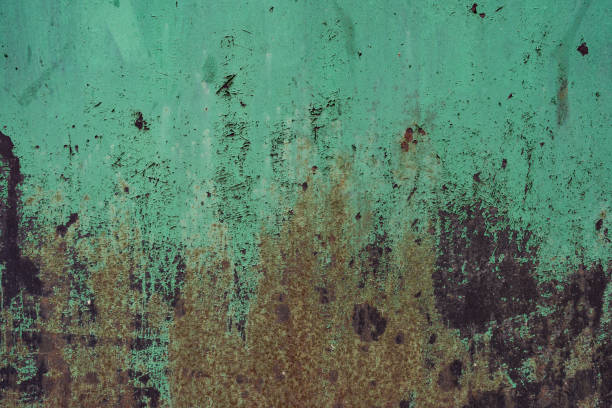 Distressed overlay texture of rusted peeled metal. Grunge background. stock photo
