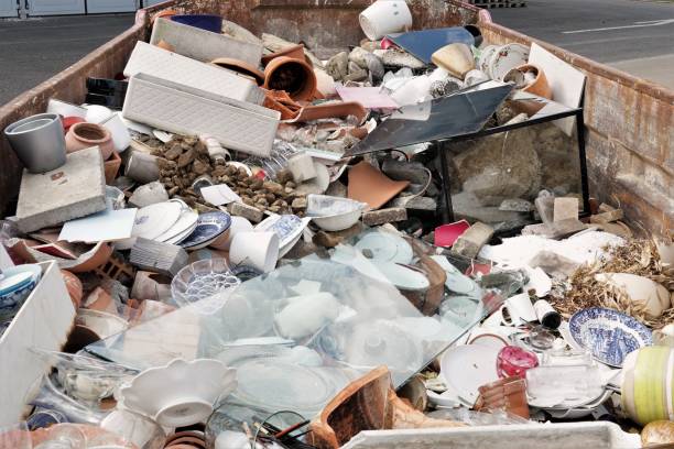 istock Community garbage disposal for population to depose safely old, broken and no longer needed home objects. 1270844171