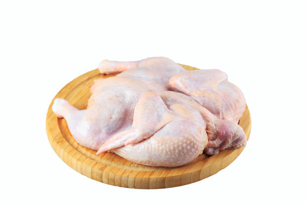 istock raw chicken carcass on the cutting board isolated on white background 1270845454