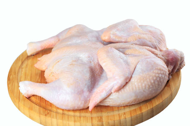 istock raw chicken carcass on the cutting board isolated on white background 1270845461