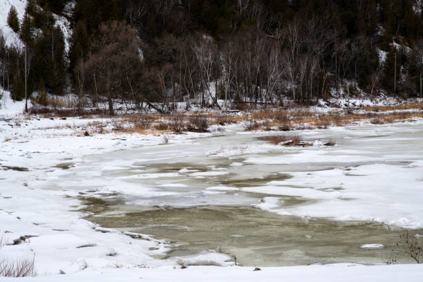 Riverbed in Winter at Montmorency Falls, Quebec, Canada