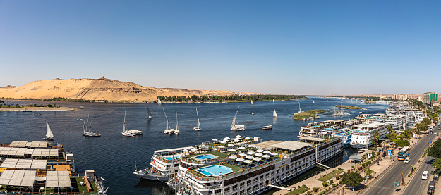 A high angle view of Aswan and the Nile river looking to the north. The Aga khan Mausoleum and Sahara Desert are to the left
