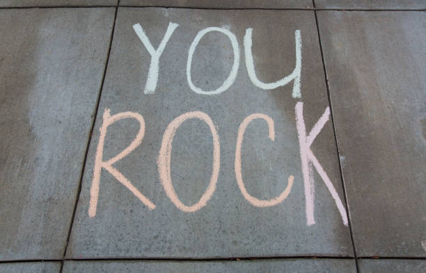 istock You rock written with sidewalk chalk 1270864270