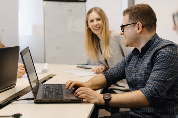 istock Colleagues working together in a conference room. 1270864849