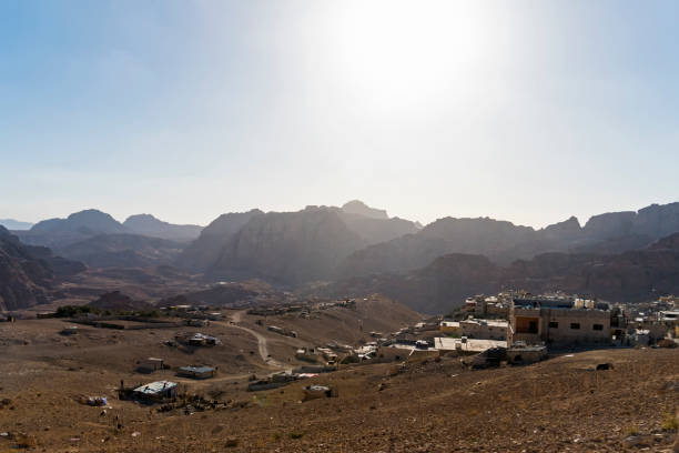 istock Sun is setting Distant mountains lit by the setting sun in Wadi Rum desert reservation, Jordan. 1270868391
