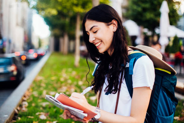 istock Girl enjoying her journey and writing notes 1270868401