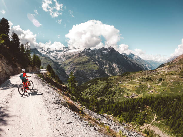 istock Mountain biker on a mountain trail in Zermat 1270868576