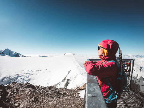istock Happy woman hiker sunbathing on klein Matterhorn 1270868581