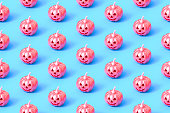 Seamless repetitive Halloween Pumpkin pattern on blue background
