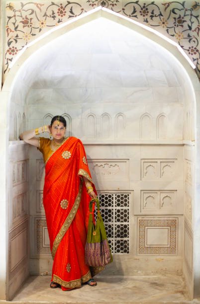 istock Indian woman dressed in traditional sari 1270869681