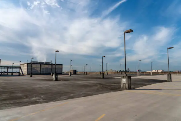 Photo of Large Roof Top Parking Lot with Mostly Clear Skies