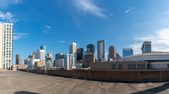 View of the Houston Skyline from Large Rooftop Parking Lot