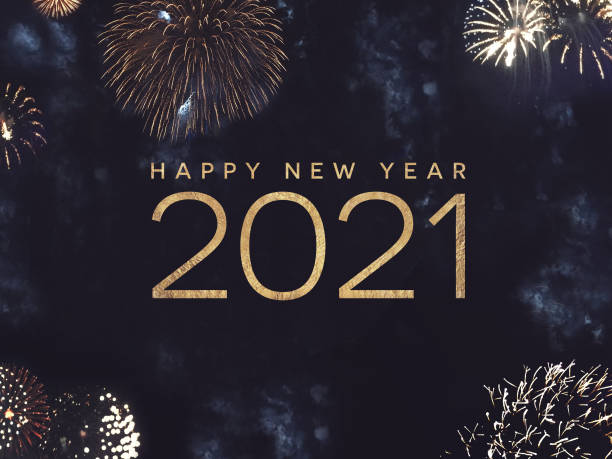 Happy New Year 2021 Text Holiday Graphic with Gold Fireworks Background in Night Sky Happy New Year 2021 Text Holiday Celebration Graphic with Gold Fireworks Background in Night Sky 2021 photos stock pictures, royalty-free photos & images