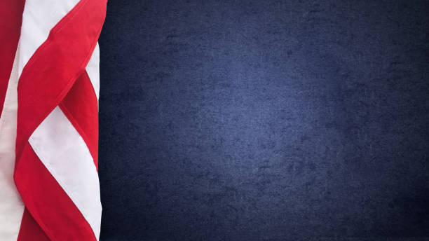 Patriotic American Flag and Blue Texture with Copy Space, United States Holiday and Election Background Patriotic American Flag and Navy Blue Texture with Copy Space, United States Holiday and Presidential Election Background presidential election stock pictures, royalty-free photos & images